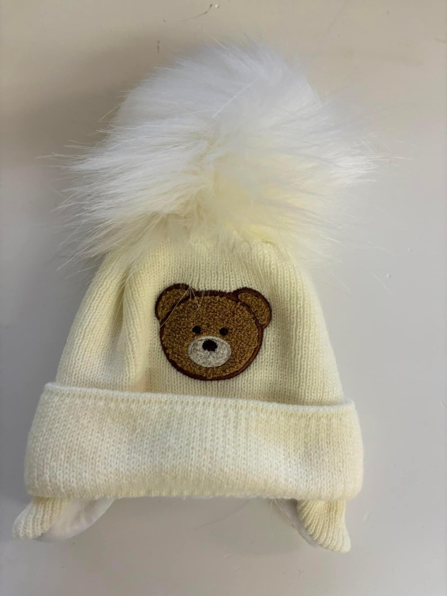 Cream teddy Pom Pom hat