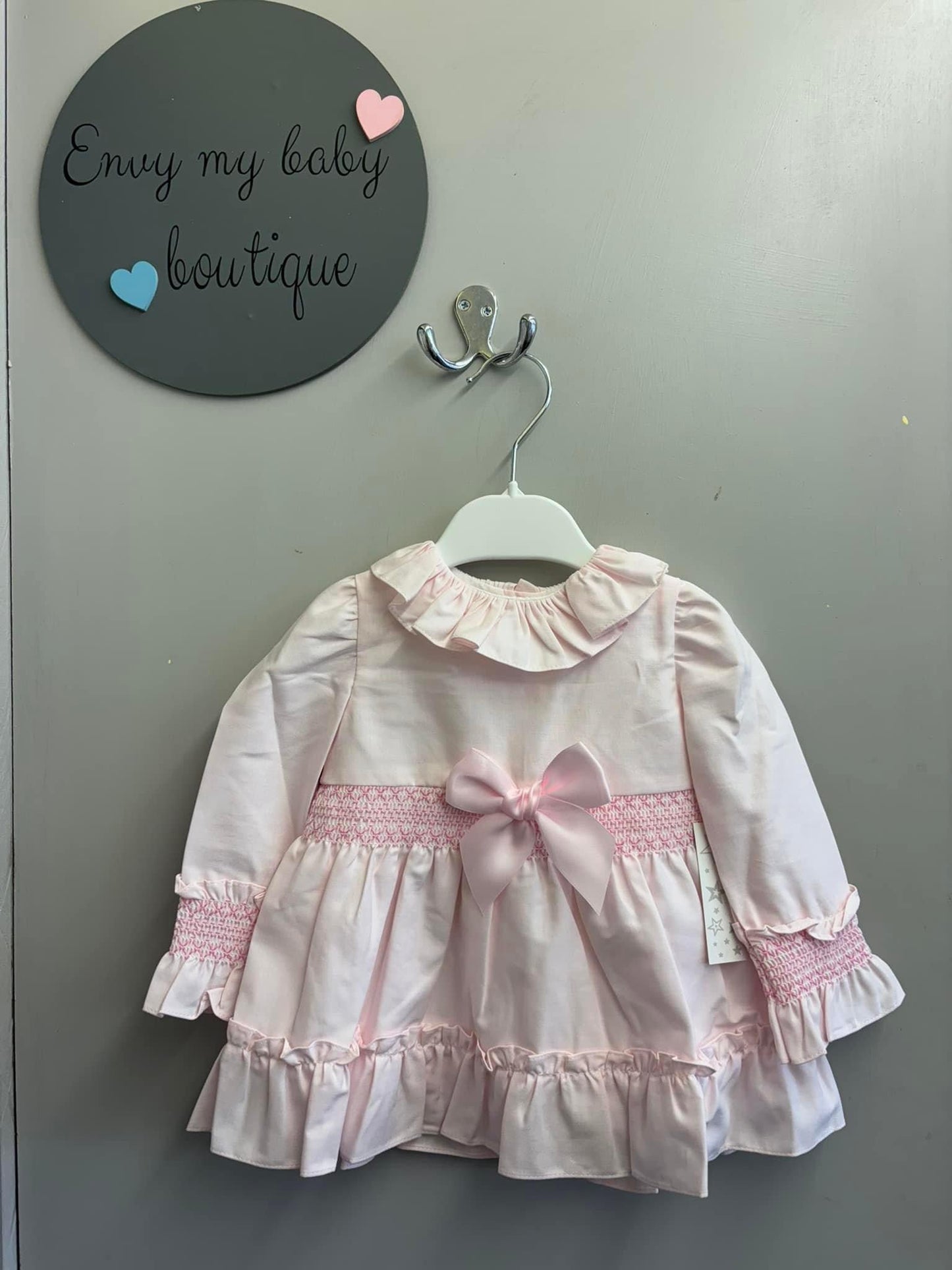 Baby girls pink smocked dress AW24