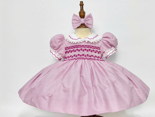 Pink smocked gingham dress