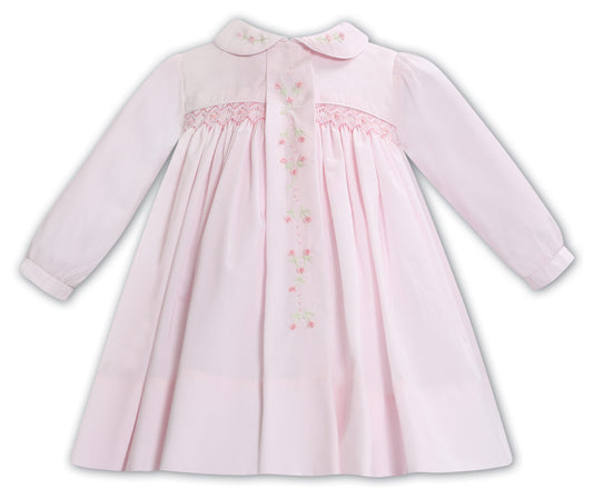 Sarah Louise baby girls pink smocked dress AW24 013356